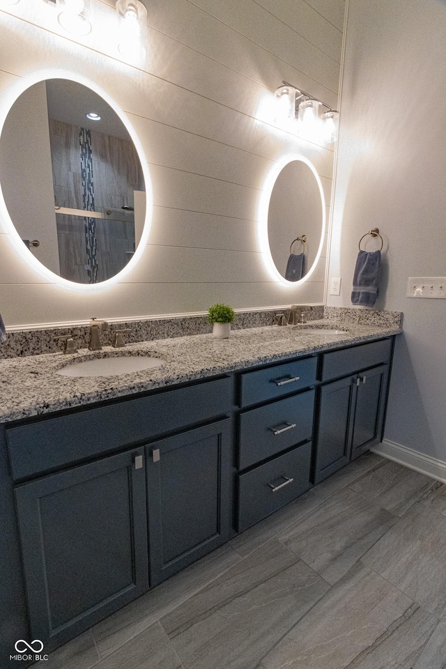 139 Wayfinder Dr, West Lafayette, IN 47906 - bathroom with double vanity and baseboards
