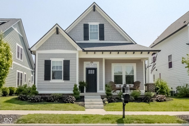 139 Wayfinder Dr, West Lafayette, IN 47906 - view of front facade featuring covered porch and a front yard