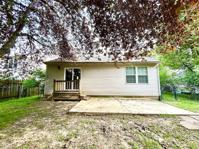 10922 Snowdrop Way, Indianapolis, IN 46235 - back of property with a patio, a wooden deck, and a gate