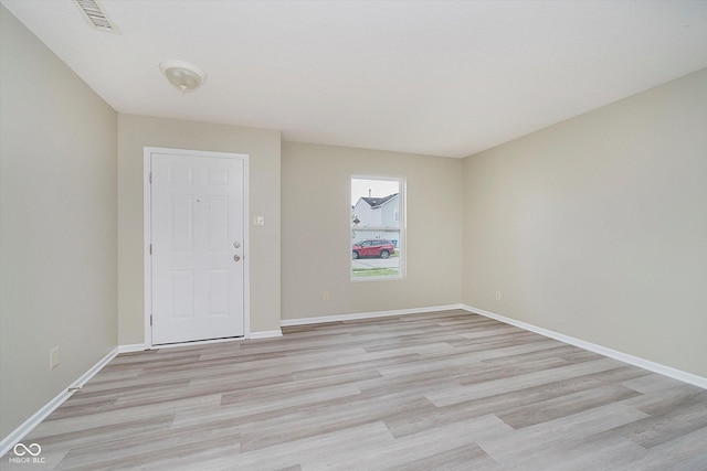 2834 Wolfgang Dr, Indianapolis, IN 46239 - unfurnished room with light wood-style flooring and baseboards