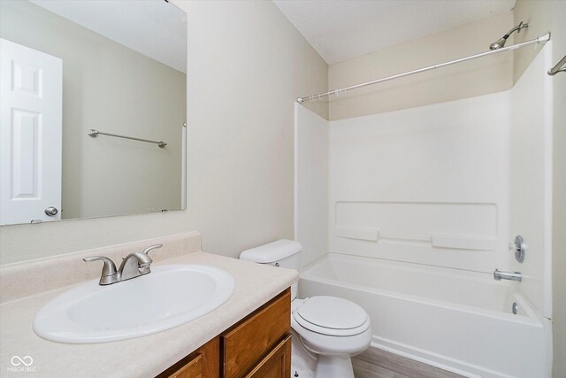 2834 Wolfgang Dr, Indianapolis, IN 46239 - full bathroom featuring vanity, toilet, and bathtub / shower combination