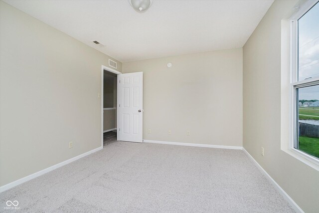 2834 Wolfgang Dr, Indianapolis, IN 46239 - carpeted empty room with baseboards