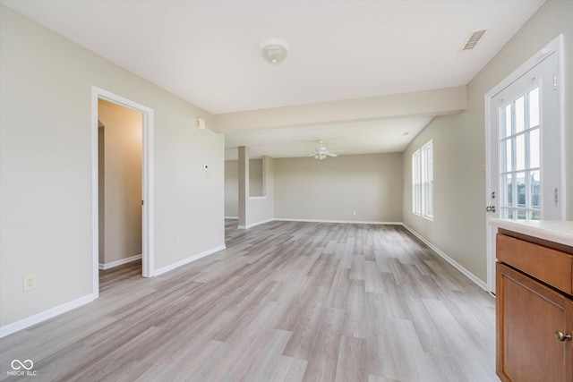 2834 Wolfgang Dr, Indianapolis, IN 46239 - empty room with light wood-type flooring, a ceiling fan, and baseboards