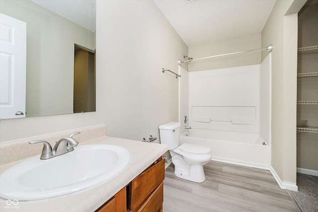 2834 Wolfgang Dr, Indianapolis, IN 46239 - bathroom with toilet, vanity, shower / bath combination, and wood finished floors