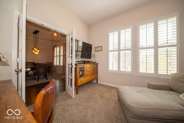 12976 Walbeck Dr, Fishers, IN 46037 - sitting room with french doors and carpet flooring