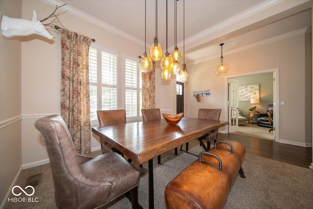12976 Walbeck Dr, Fishers, IN 46037 - dining area featuring crown molding and carpet flooring