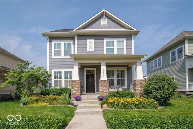 12976 Walbeck Dr, Fishers, IN 46037 - craftsman-style house featuring covered porch and stone siding