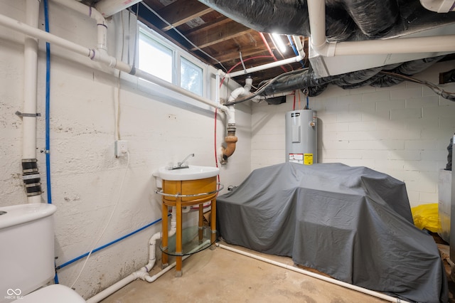 110 E Harrison St, Spiceland, IN 47346 - basement featuring electric water heater and a sink