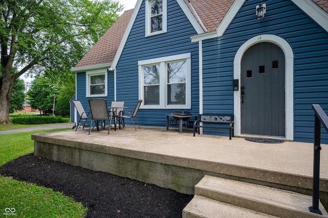 110 E Harrison St, Spiceland, IN 47346 - back of house featuring a shingled roof