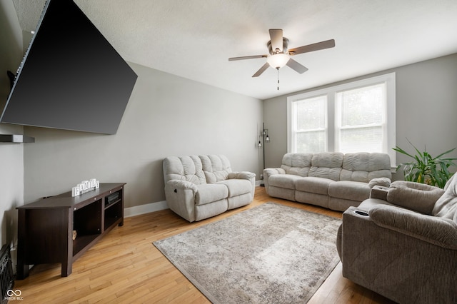 110 E Harrison St, Spiceland, IN 47346 - living room with ceiling fan and light wood finished floors