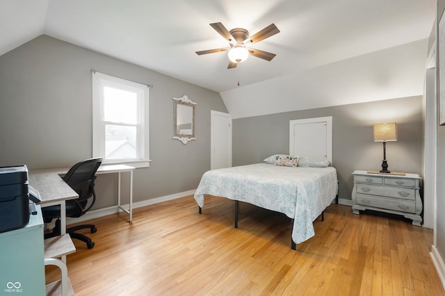 110 E Harrison St, Spiceland, IN 47346 - bedroom with vaulted ceiling, a desk, light wood finished floors, and a ceiling fan