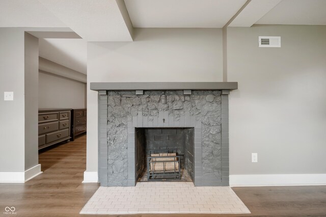 110 E Harrison St, Spiceland, IN 47346 - detailed view of wood finished floors and a fireplace