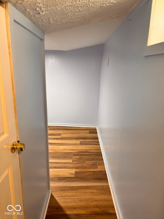624 N Rural St, Indianapolis, IN 46201 - hallway with wood finished floors and baseboards