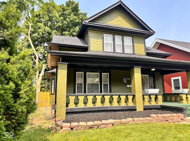 624 N Rural St, Indianapolis, IN 46201 - view of front of house with covered porch and roof with shingles