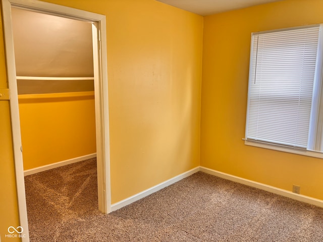 624 N Rural St, Indianapolis, IN 46201 - unfurnished bedroom featuring carpet flooring and baseboards