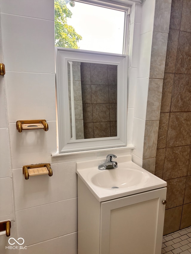624 N Rural St, Indianapolis, IN 46201 - bathroom with vanity and tile walls