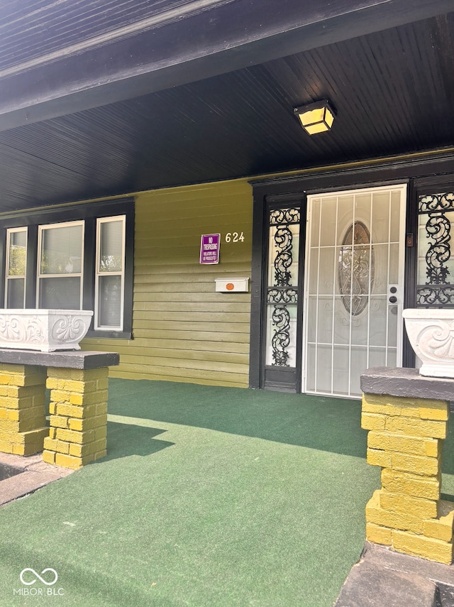 624 N Rural St, Indianapolis, IN 46201 - view of exterior entry with a porch