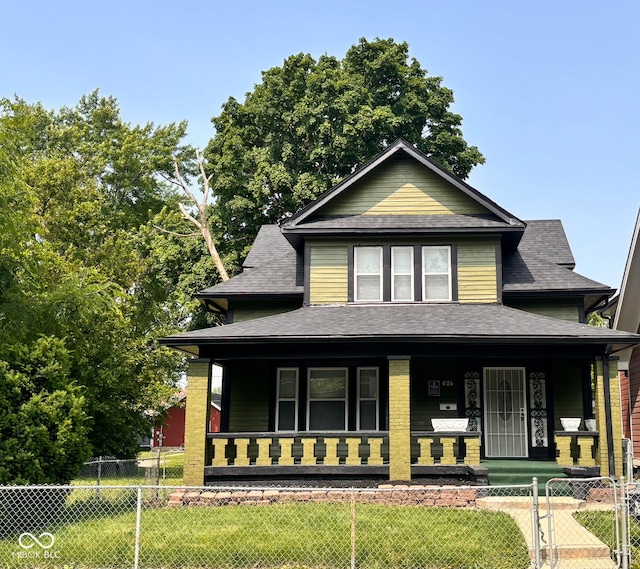 624 N Rural St, Indianapolis, IN 46201 - view of front of house featuring a porch and a shingled roof