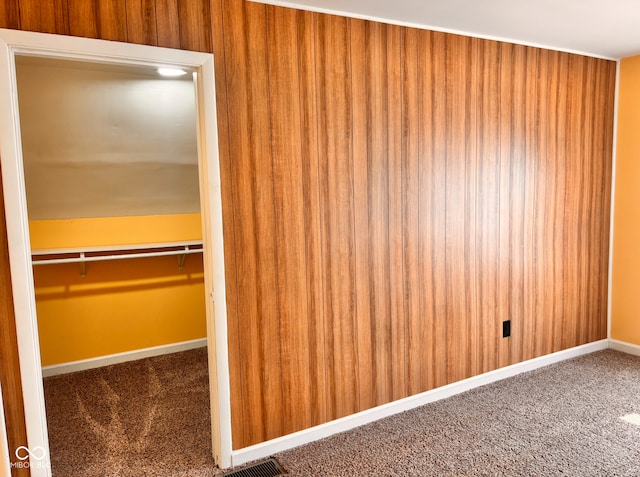 624 N Rural St, Indianapolis, IN 46201 - unfurnished bedroom featuring carpet, baseboards, and a closet