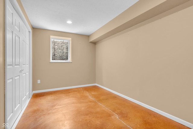 2948 Chalbury Dr, Plainfield, IN 46168 - unfurnished bedroom featuring finished concrete flooring, a closet, and recessed lighting