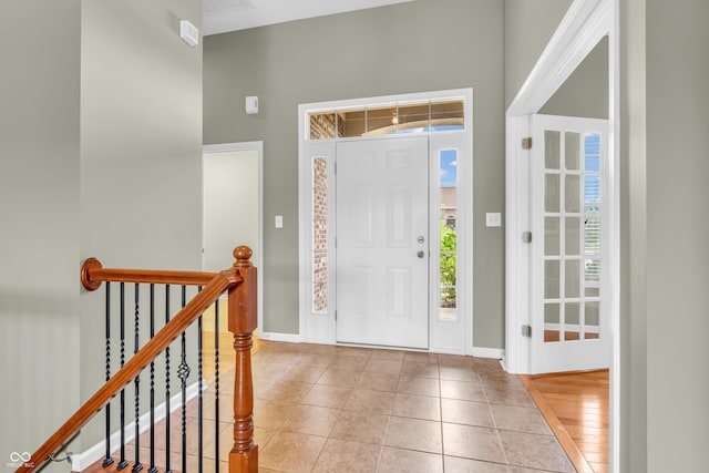 2948 Chalbury Dr, Plainfield, IN 46168 - foyer entrance with a towering ceiling and light tile patterned flooring