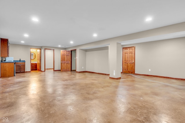2948 Chalbury Dr, Plainfield, IN 46168 - unfurnished living room featuring concrete floors and recessed lighting