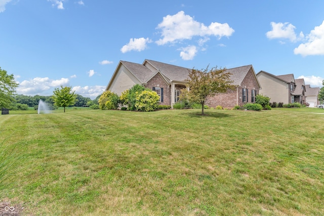 2948 Chalbury Dr, Plainfield, IN 46168 - view of front facade with a front yard and brick siding
