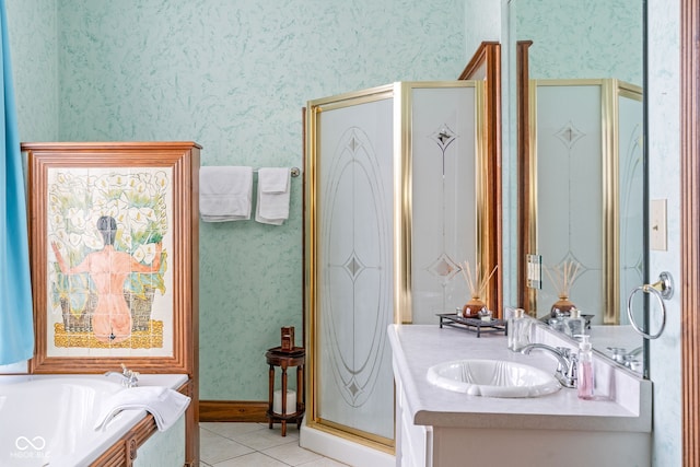 239 E 11th St, Indianapolis, IN 46202 - bathroom featuring wallpapered walls, tile patterned flooring, a shower stall, vanity, and a garden tub