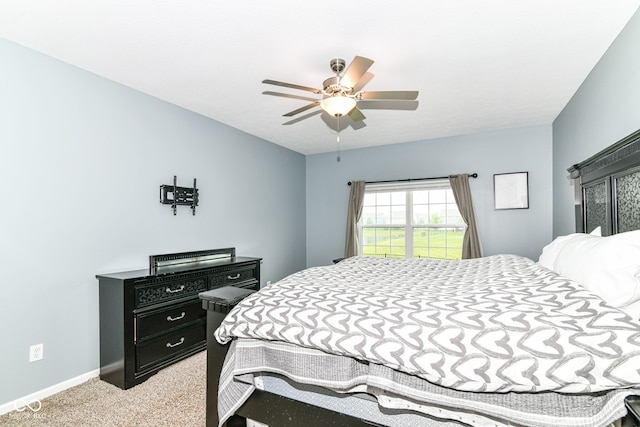 5439 Maywood Dr, Whitestown, IN 46075 - bedroom with light colored carpet, baseboards, and ceiling fan