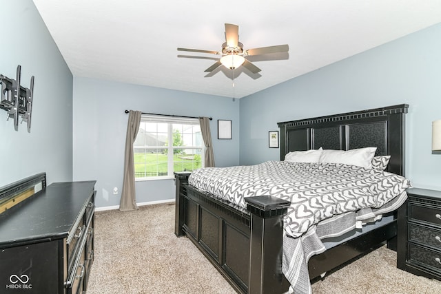 5439 Maywood Dr, Whitestown, IN 46075 - bedroom featuring light colored carpet, baseboards, and ceiling fan