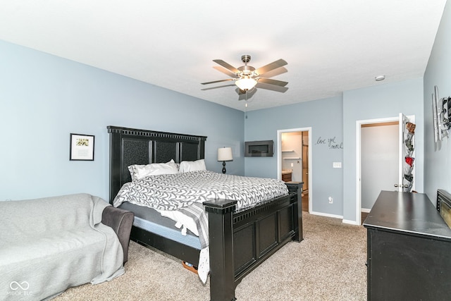 5439 Maywood Dr, Whitestown, IN 46075 - bedroom featuring light colored carpet, ceiling fan, baseboards, and ensuite bathroom
