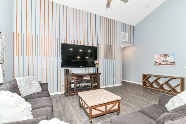 5439 Maywood Dr, Whitestown, IN 46075 - living room with wood finished floors, ceiling fan, baseboards, and high vaulted ceiling