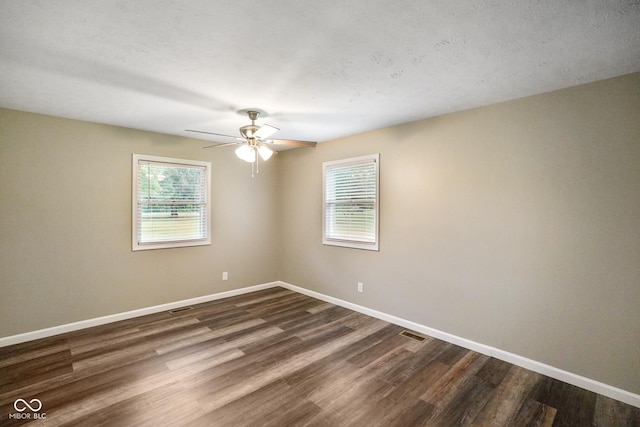 9378 N County Road 75 W, Lizton, IN 46149 - unfurnished room featuring plenty of natural light, dark wood finished floors, and baseboards
