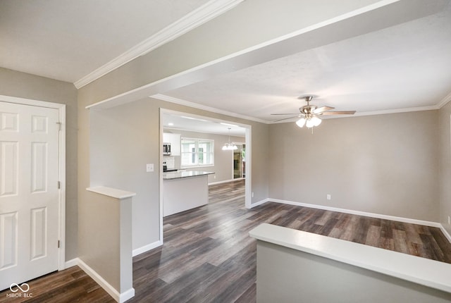 9378 N County Road 75 W, Lizton, IN 46149 - foyer entrance featuring crown molding, dark wood-style flooring, a ceiling fan, baseboards, and a chandelier