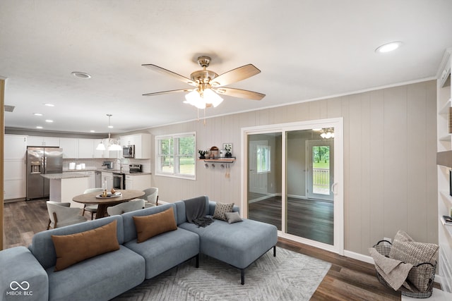 9378 N County Road 75 W, Lizton, IN 46149 - living area featuring dark wood-style flooring, crown molding, ceiling fan, a chandelier, and recessed lighting