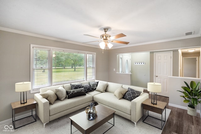9378 N County Road 75 W, Lizton, IN 46149 - living area with crown molding, baseboards, wood finished floors, and a ceiling fan