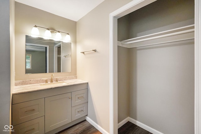 9378 N County Road 75 W, Lizton, IN 46149 - bathroom featuring vanity, wood finished floors, and baseboards