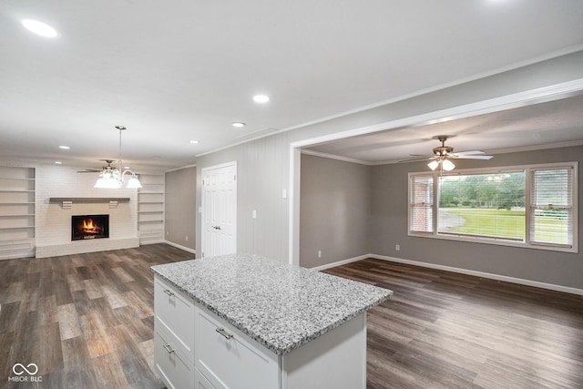 9378 N County Road 75 W, Lizton, IN 46149 - kitchen featuring open floor plan, a ceiling fan, baseboards, ornamental molding, and dark wood finished floors
