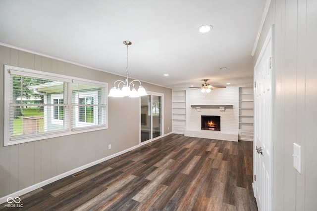 9378 N County Road 75 W, Lizton, IN 46149 - unfurnished living room with a brick fireplace, dark wood finished floors, crown molding, baseboards, and recessed lighting