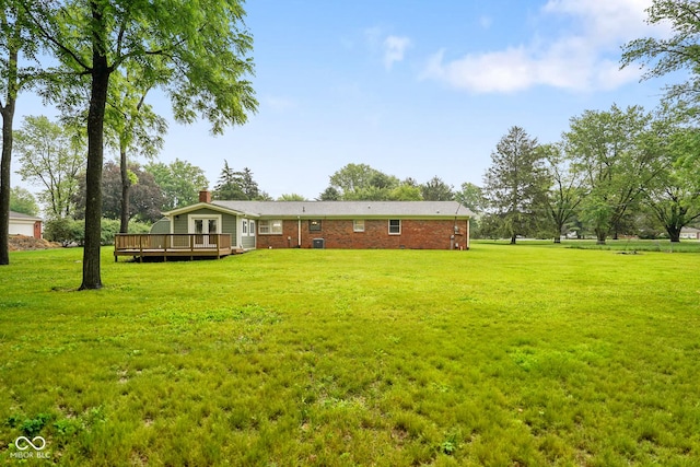 9378 N County Road 75 W, Lizton, IN 46149 - view of green lawn featuring a deck and central AC unit