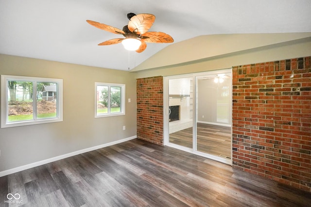 9378 N County Road 75 W, Lizton, IN 46149 - unfurnished bedroom with dark wood-type flooring, vaulted ceiling, a closet, baseboards, and a ceiling fan
