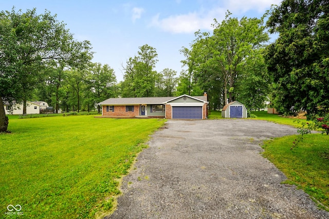 9378 N County Road 75 W, Lizton, IN 46149 - ranch-style home with asphalt driveway, a front yard, a chimney, a garage, and brick siding
