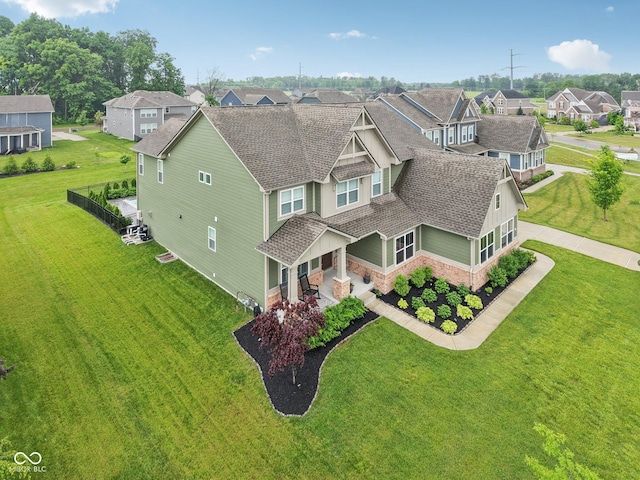 8165 Oakley Ter, Zionsville, IN 46077 - craftsman house featuring a residential view, roof with shingles, stone siding, a garage, and driveway