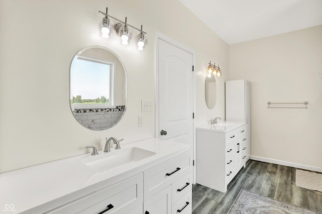 3301 N 200 W, Franklin, IN 46131 - full bath featuring two vanities, wood finished floors, and baseboards