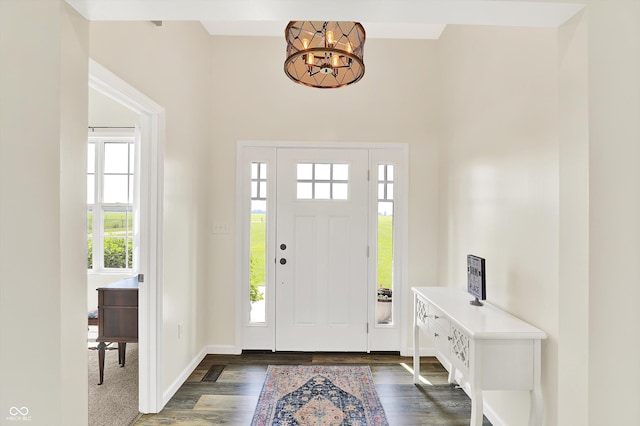 3301 N 200 W, Franklin, IN 46131 - entrance foyer featuring healthy amount of natural light, a chandelier, wood finished floors, a towering ceiling, and baseboards