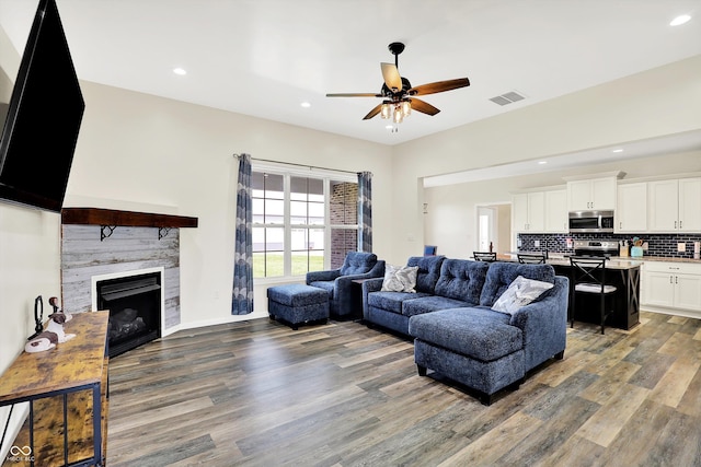 3301 N 200 W, Franklin, IN 46131 - living room with dark wood-style flooring, a ceiling fan, a fireplace, and recessed lighting