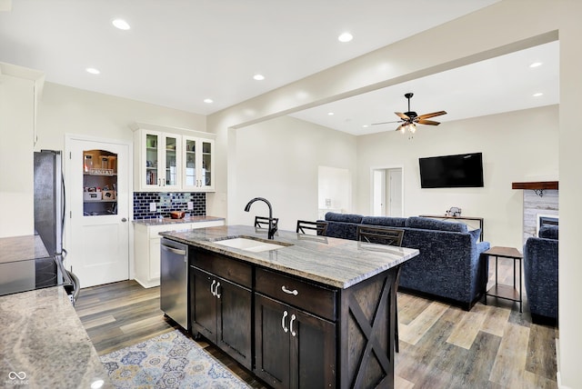 3301 N 200 W, Franklin, IN 46131 - kitchen with stainless steel appliances, a sink, light wood-style floors, white cabinetry, and ceiling fan