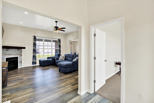 3301 N 200 W, Franklin, IN 46131 - living area with wood finished floors, ceiling fan, a fireplace, baseboards, and recessed lighting