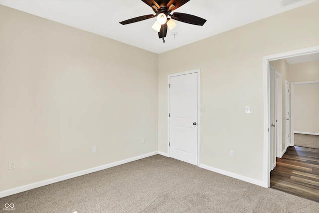 3301 N 200 W, Franklin, IN 46131 - unfurnished bedroom featuring carpet, baseboards, and a ceiling fan