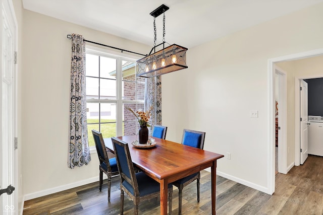 3301 N 200 W, Franklin, IN 46131 - dining area featuring wood finished floors, baseboards, and washer / dryer
